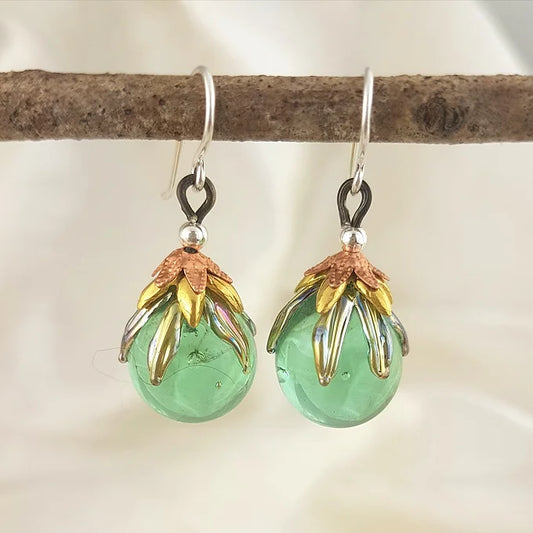 Pale emerald glass orb earrings