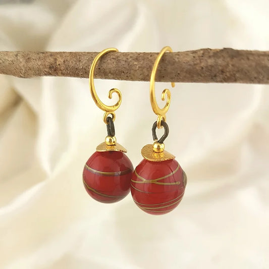 Red orb earrings
